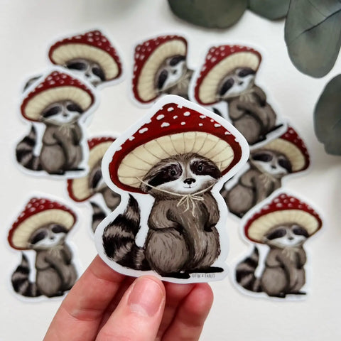 "Raccoon Mushroom Cap" Sticker by Fox & Fables